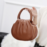 Radiant Poise Handbag