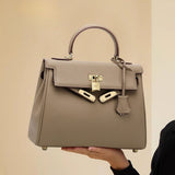 Ivory Crest Handbag