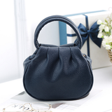 Radiant Poise Handbag