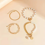 Chic Gold 4-Piece Bracelet Set - Snake, Pearls & Links | Gold